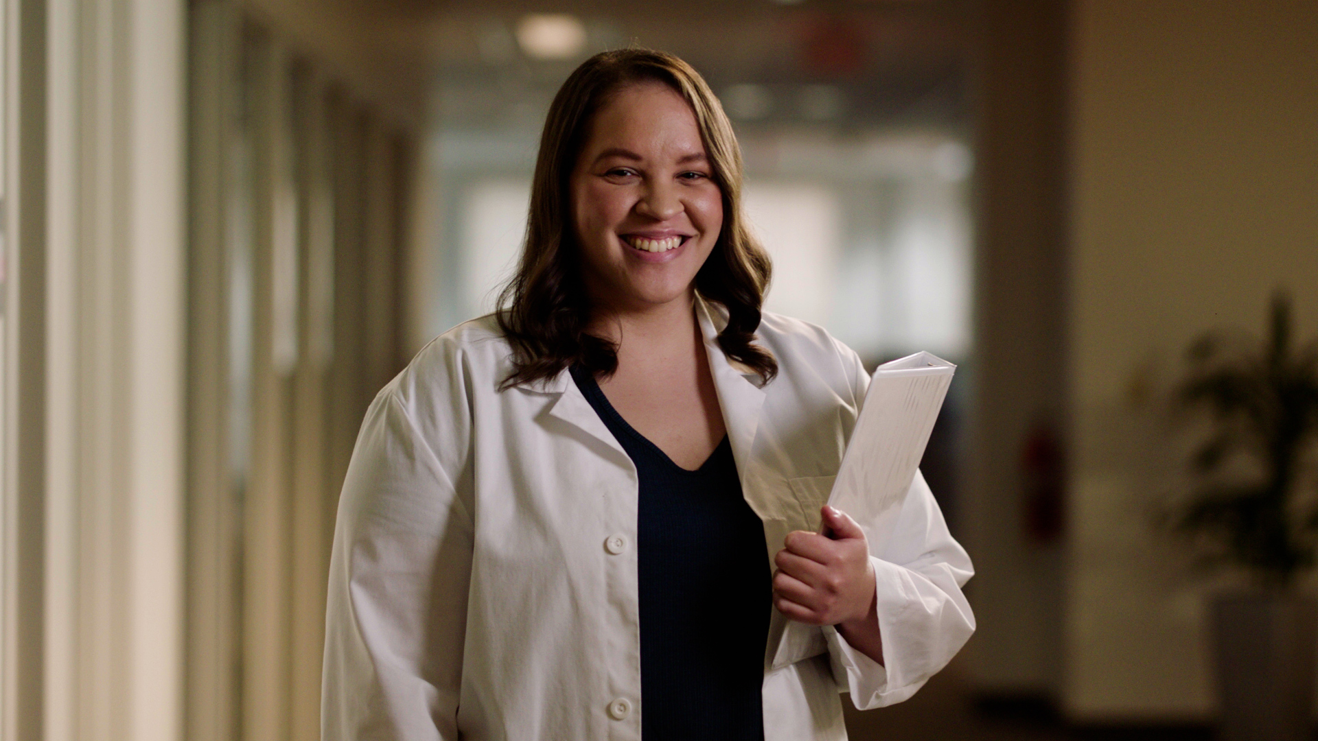 Female doctor smiling at camera